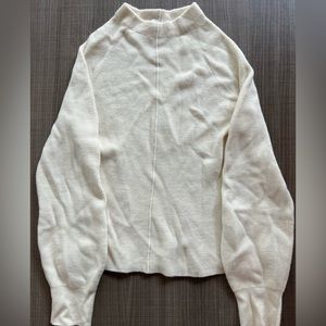 Knitted cream sweater